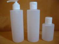 Rundflaschen mit Klappscharnierverschluss und Spritzeinsatz Rundflaschen mit Klappscharnierverschluss und Spritzeinsatz